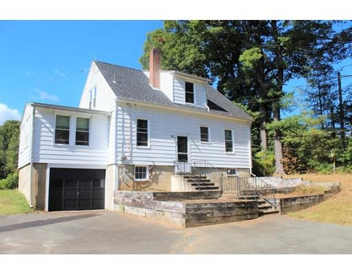 257 Greenwich Road Ware, MA 01082 - Photo 4 of 41 a view of a white house with large windows and refrigerator