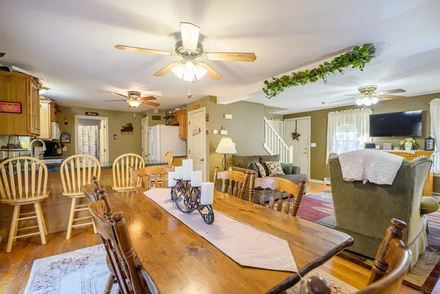 a view of a dining room with furniture
