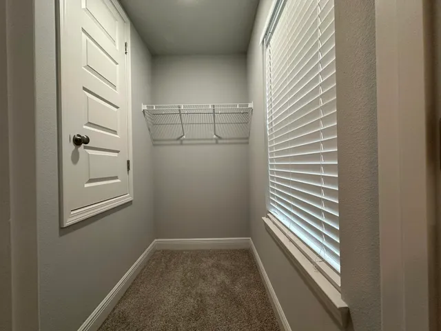 a view of storage and utility room