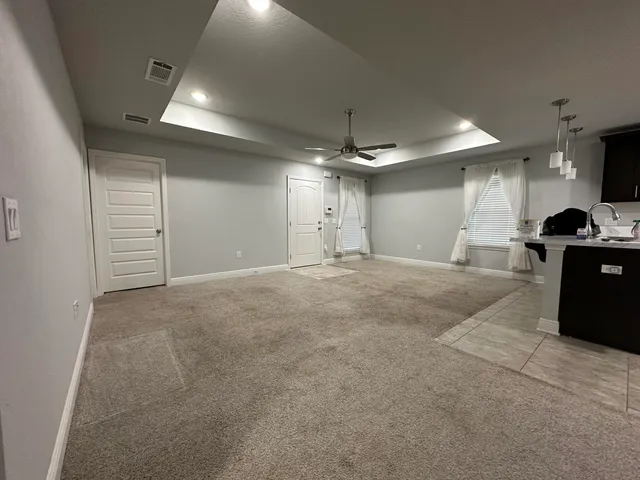 a view of a kitchen with a sink