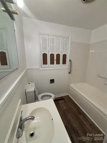 a bathroom with a sink and a bathtub