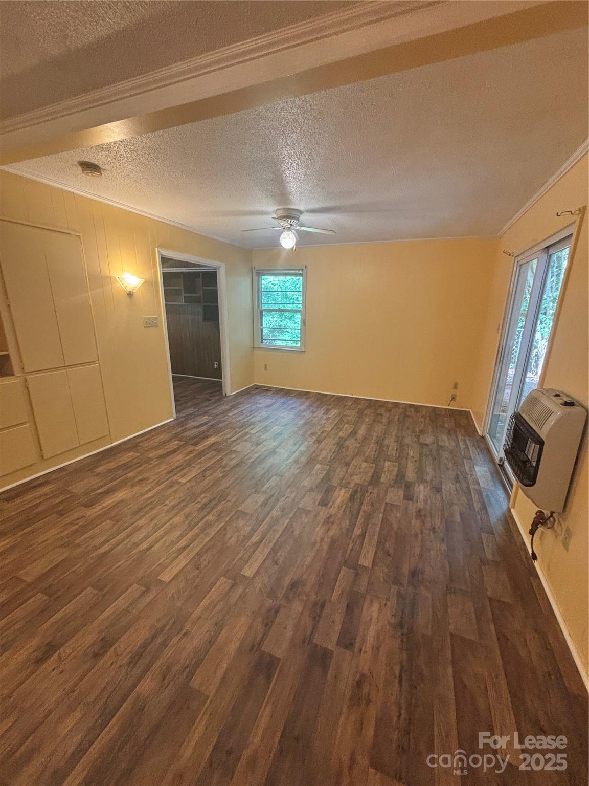 724 Oakdale Drive Statesville, NC 28677 - Photo 8 of 19 a view of empty room with wooden floor