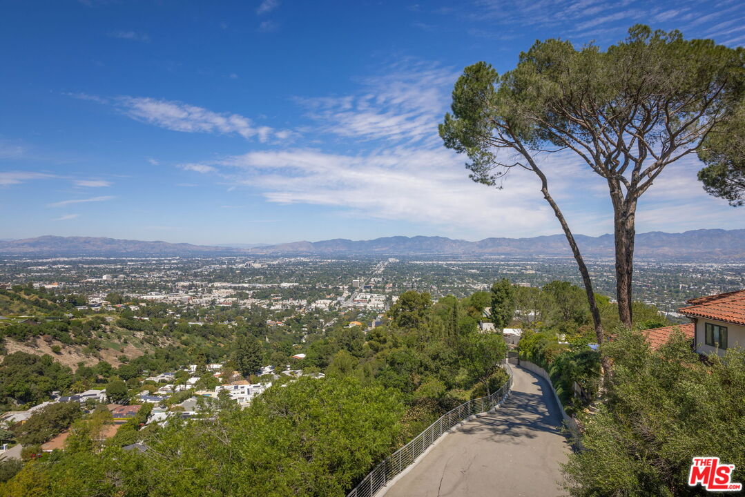 3337 Beverly Ranch Road Beverly Hills, CA 90210 - Photo 24 of 36 a view of a city with mountains in the background