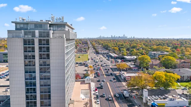 a view of a city with tall buildings
