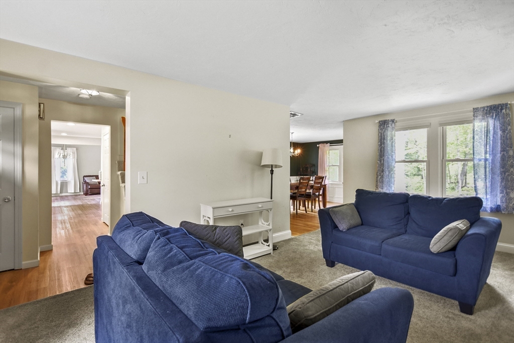 187 Eaton Road Framingham, MA 01701 - Photo 11 of 41 a living room with a couch and a window