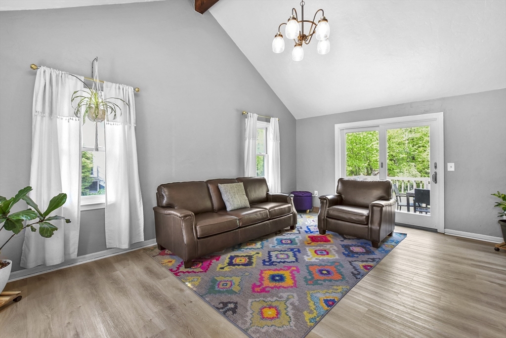 187 Eaton Road Framingham, MA 01701 - Photo 14 of 41 a living room with furniture and a wooden floor