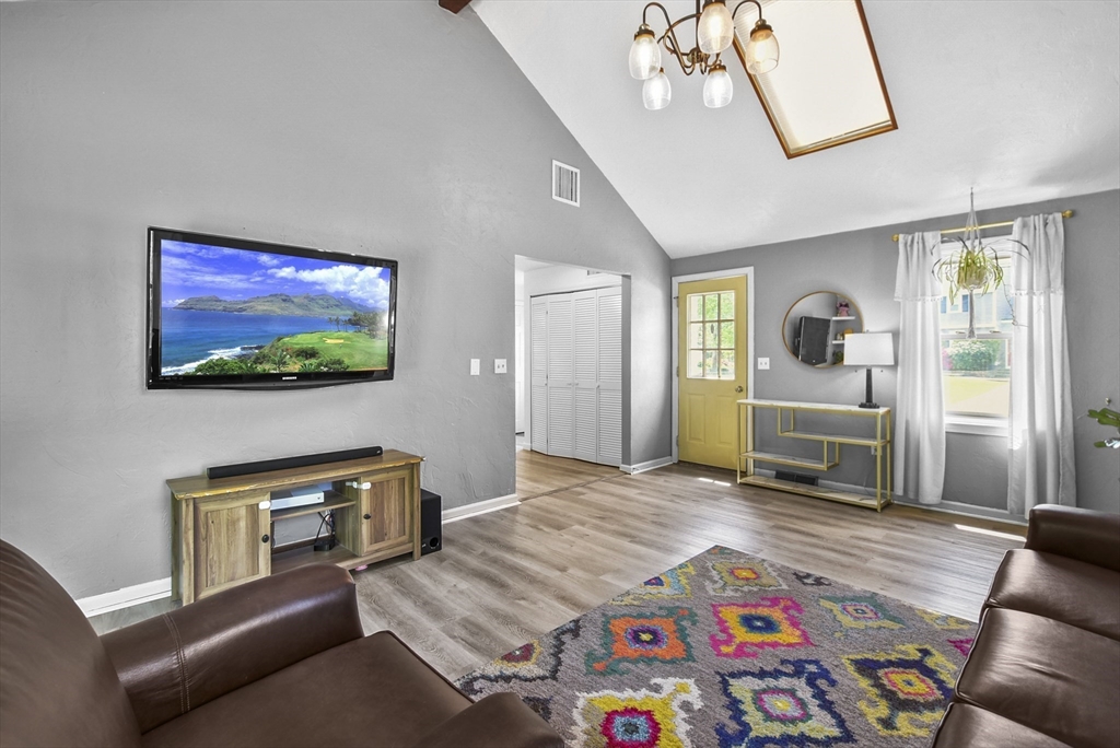 187 Eaton Road Framingham, MA 01701 - Photo 16 of 41 a bedroom with furniture and a flat screen tv
