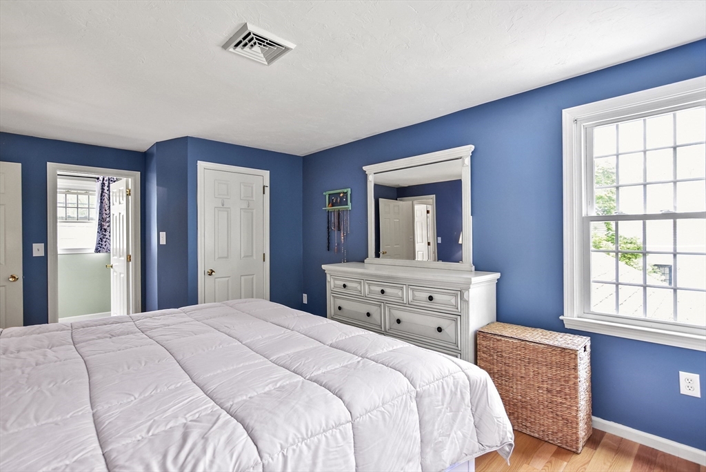 187 Eaton Road Framingham, MA 01701 - Photo 20 of 41 a bedroom with a bed and a dresser