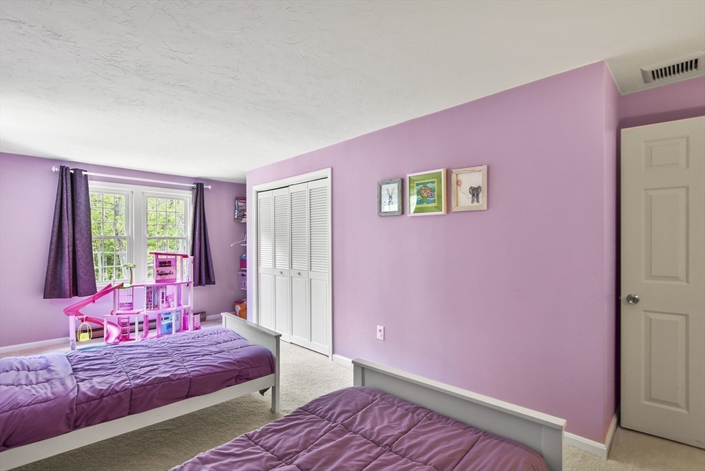 187 Eaton Road Framingham, MA 01701 - Photo 23 of 41 a bedroom with a bed and a window