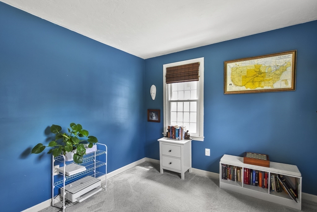 187 Eaton Road Framingham, MA 01701 - Photo 30 of 41 a room with furniture and a potted plant