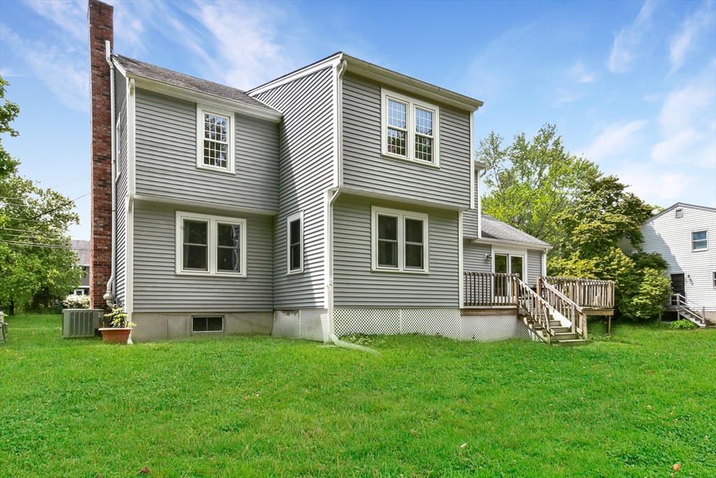 187 Eaton Road Framingham, MA 01701 - Photo 35 of 41 a front view of house with yard and green space