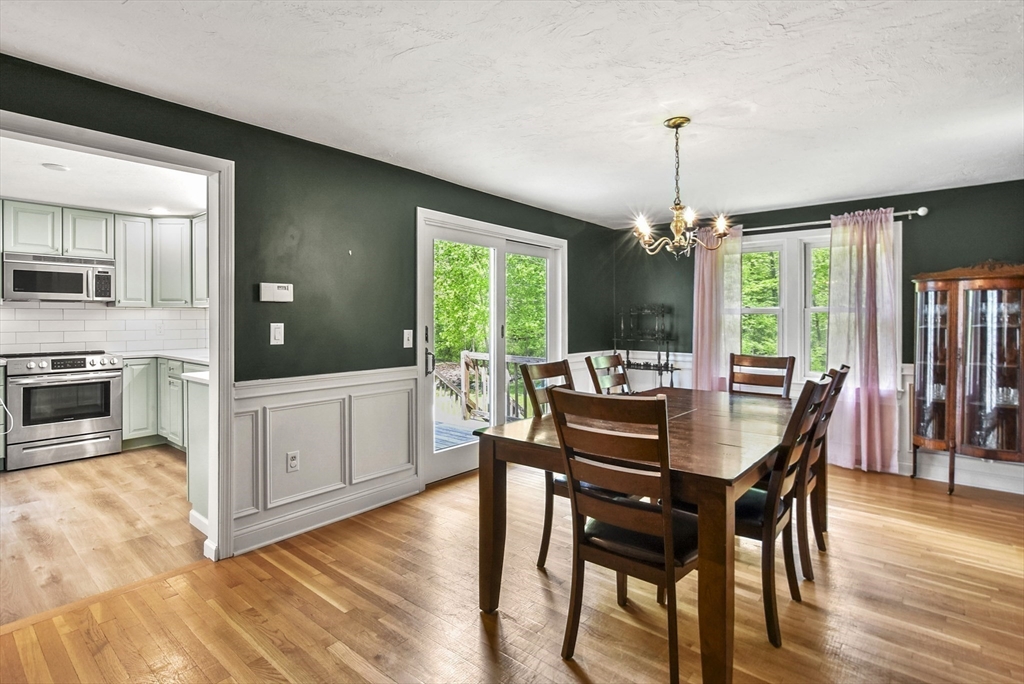 187 Eaton Road Framingham, MA 01701 - Photo 8 of 41 a view of a dining room with furniture window and wooden floor