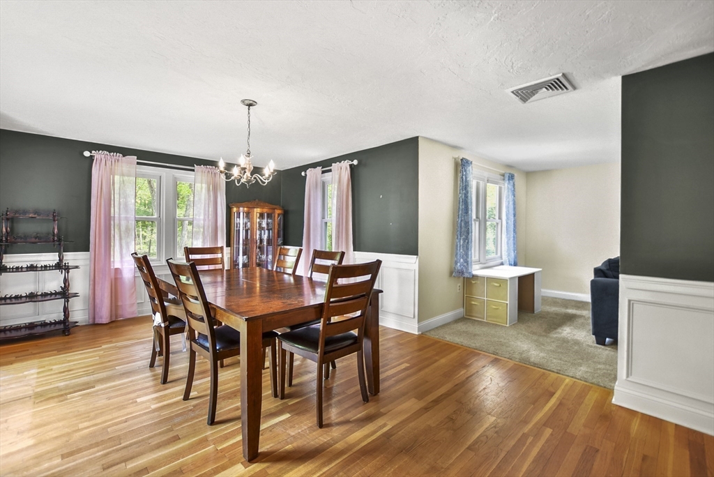 187 Eaton Road Framingham, MA 01701 - Photo 9 of 41 a view of a dining room with furniture window and wooden floor