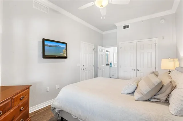 a bathroom with a double vanity sink toilet and a mirror