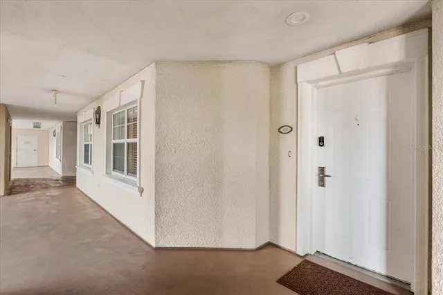 a view of a porch with a fence