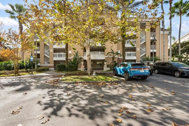 a view of a swimming pool and lounge chairs