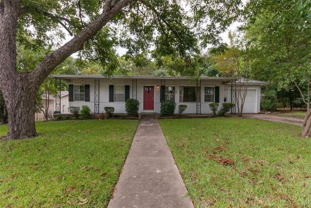 2805 Windsor Road Austin, TX 78703 - Photo 1 of 1 a front view of house with yard and green space