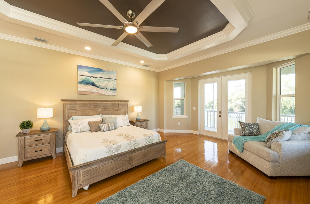 2 Go Lane Key West, FL 33040 - Photo 14 of 42 a bedroom with a large bed and a couch