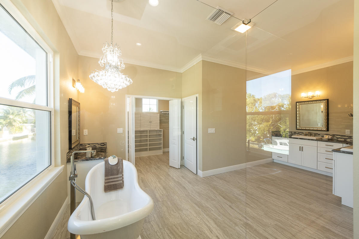 2 Go Lane Key West, FL 33040 - Photo 16 of 42 a large living room with stainless steel appliances furniture and a large window