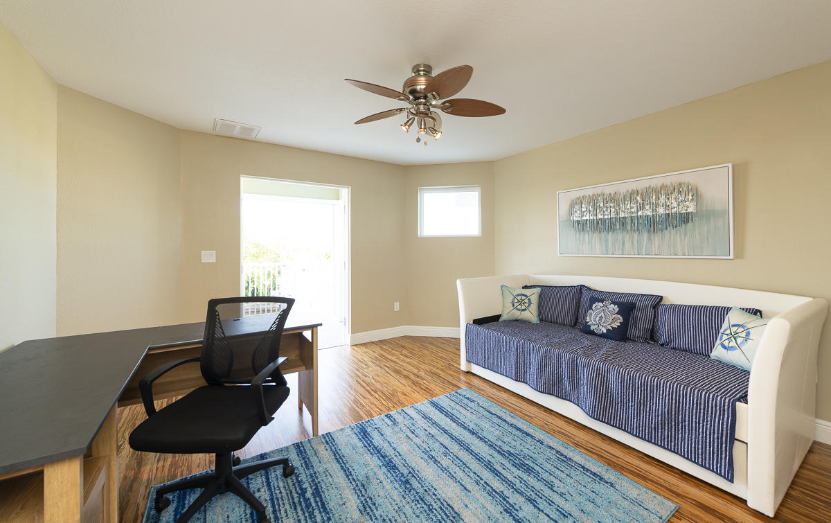 2 Go Lane Key West, FL 33040 - Photo 22 of 42 a living room with furniture and a wooden floor