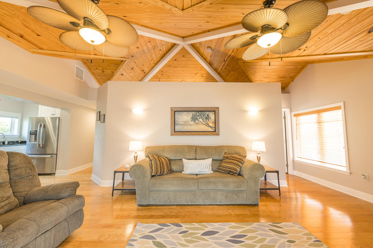 2 Go Lane Key West, FL 33040 - Photo 30 of 42 a living room with furniture and a flat screen tv