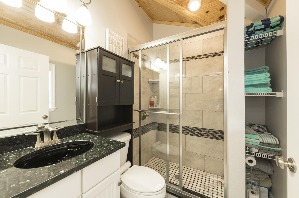 2 Go Lane Key West, FL 33040 - Photo 35 of 42 a bathroom with a sink a toilet and shower