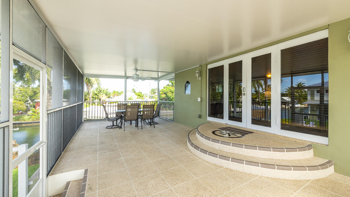 2 Go Lane Key West, FL 33040 - Photo 37 of 42 a dining room with furniture and a large window