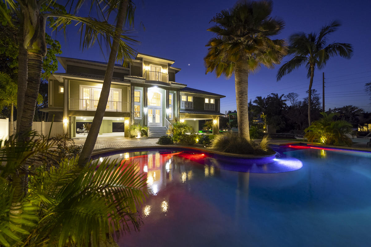 2 Go Lane Key West, FL 33040 - Photo 41 of 42 a view of swimming pool with a table and chairs