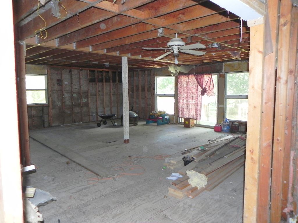 2024 Hillsdown Road Lake Summerset, IL 61019 - Photo 3 of 8 a room with gym equipment and large windows