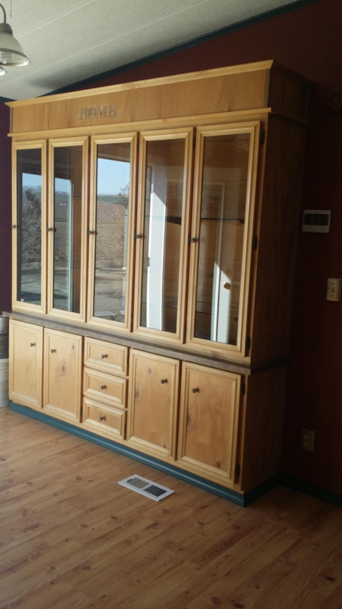 2861 Independence Road Outlook, WA 98938 - Photo 15 of 35 view of an empty room with wooden floor and a window