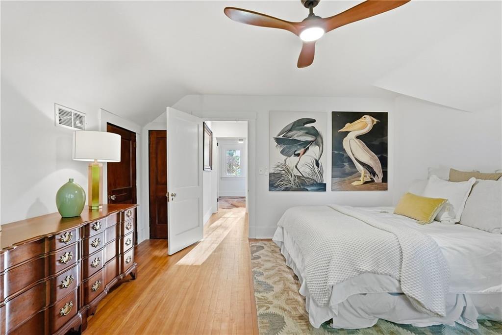 3944 Bakerstown Road Gibsonia, PA 15044 - Photo 40 of 50 a bedroom with a bed and wooden floor