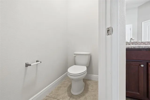 a bathroom with a toilet and a sink
