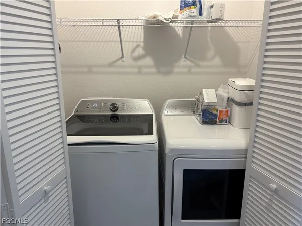 a close view of a sink and a stove in the kitchen