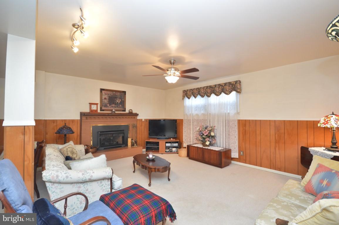 7809 Ontario Road Gainesville, VA 20155 - Photo 20 of 27 Rec Room with Fireplace