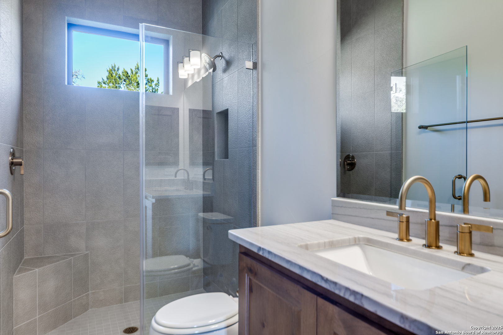 193 Ranch Heights Boerne, TX 78015 - Photo 23 of 29 a bathroom with a granite countertop sink toilet and shower
