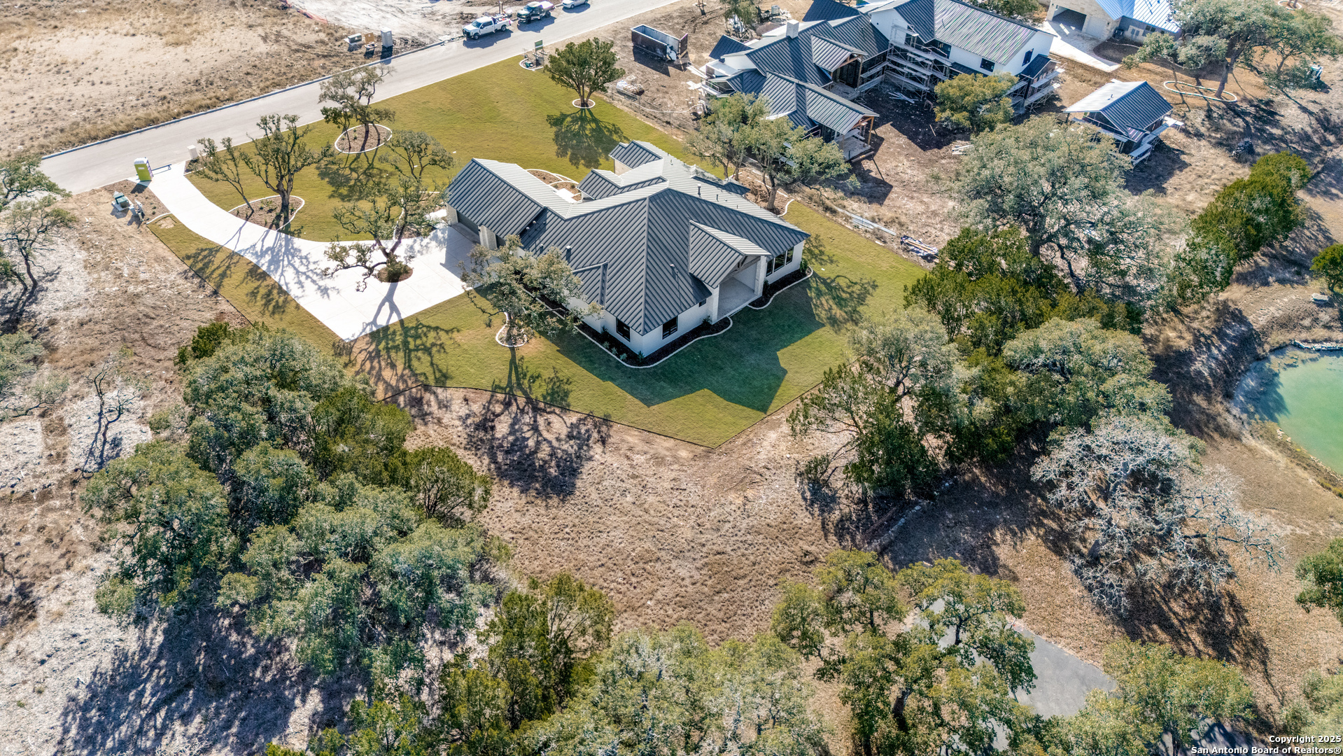 193 Ranch Heights Boerne, TX 78015 - Photo 27 of 29 an aerial view of a house with a yard and lake view