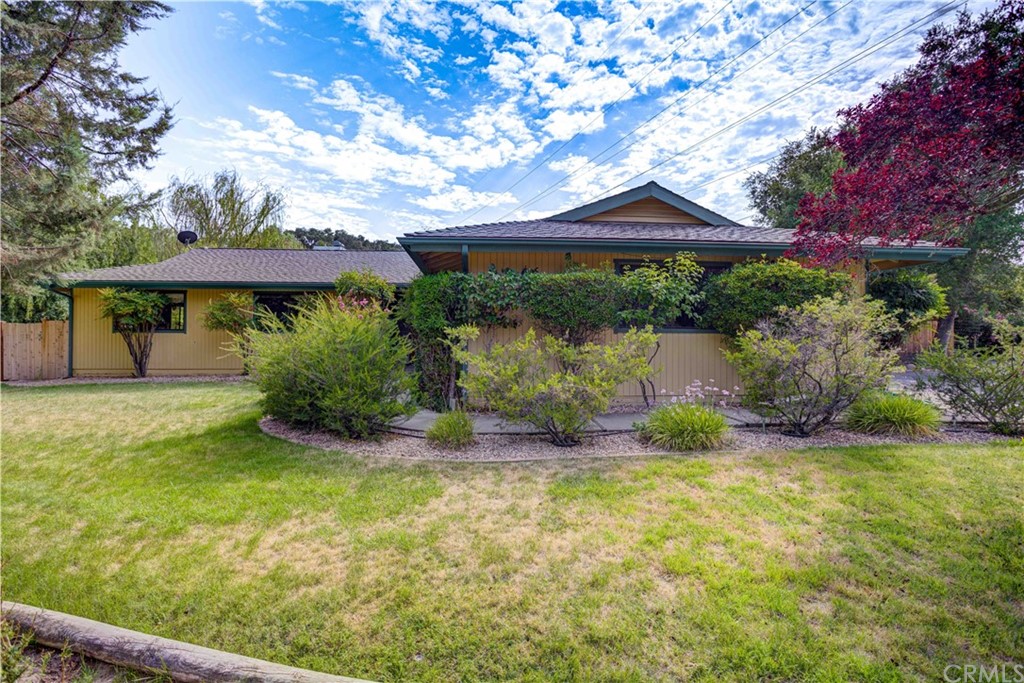 1020 Garcia Road Atascadero, CA 93422 - Photo 1 of 1 a view of a house with a yard and sitting area