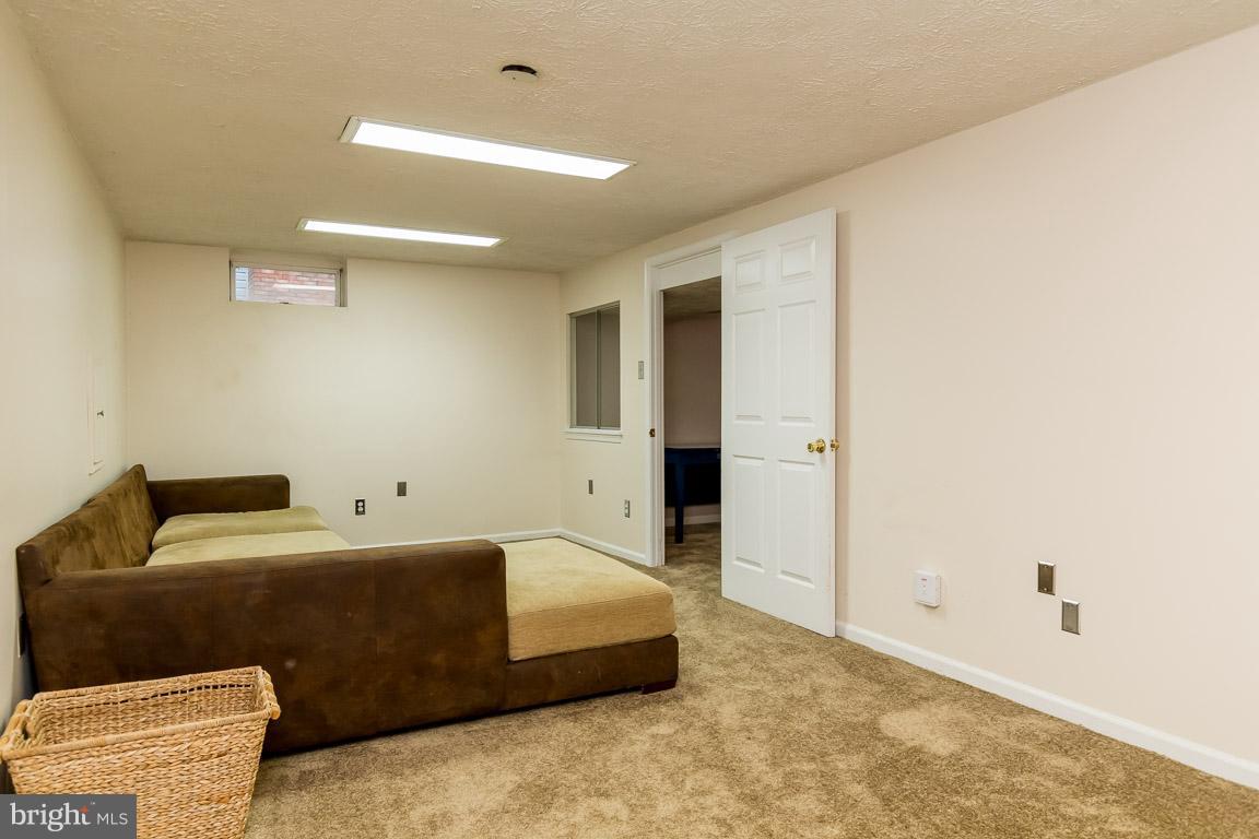 288 East Padonia Road Cockeysville, MD 21030 - Photo 25 of 30 Finished basement with new carpeting