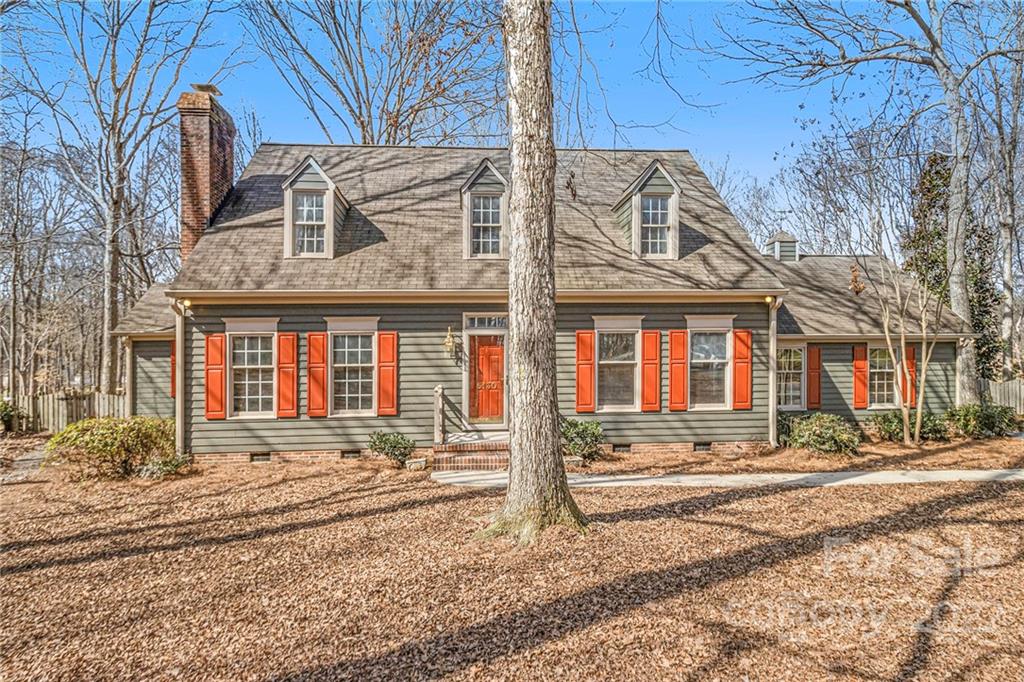 5130 Panhandle Circle Matthews, NC 28104 - Photo 1 of 20 a front view of a house with a yard
