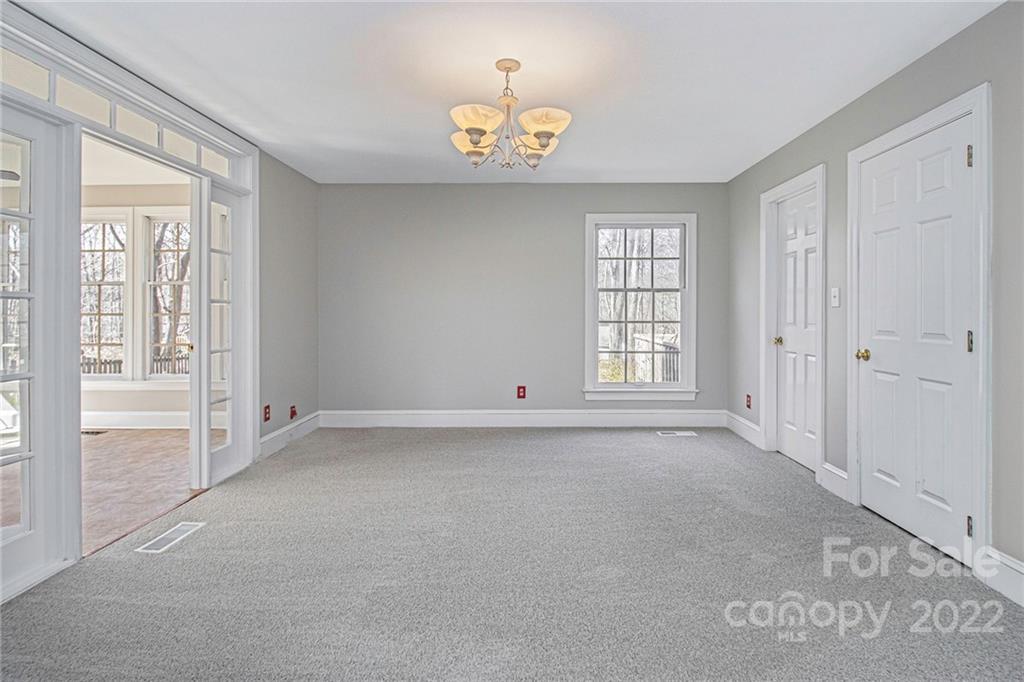 5130 Panhandle Circle Matthews, NC 28104 - Photo 11 of 20 a view of an empty room with a window
