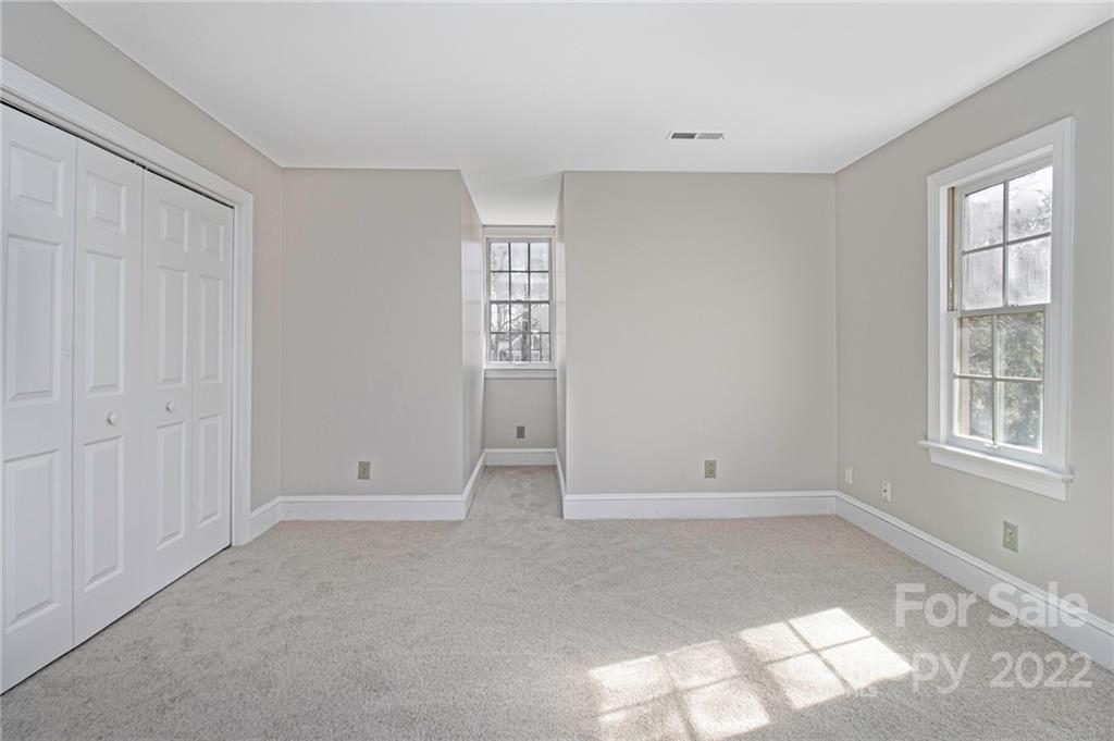 5130 Panhandle Circle Matthews, NC 28104 - Photo 13 of 20 an empty room with windows