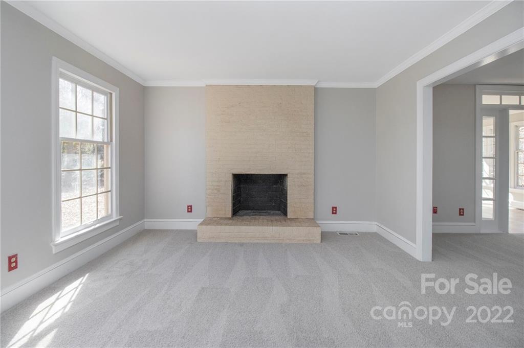 5130 Panhandle Circle Matthews, NC 28104 - Photo 2 of 20 an empty room with windows