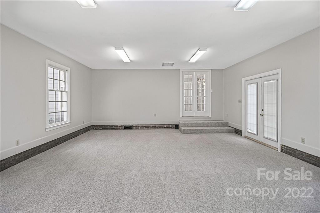 5130 Panhandle Circle Matthews, NC 28104 - Photo 9 of 20 an empty room with windows