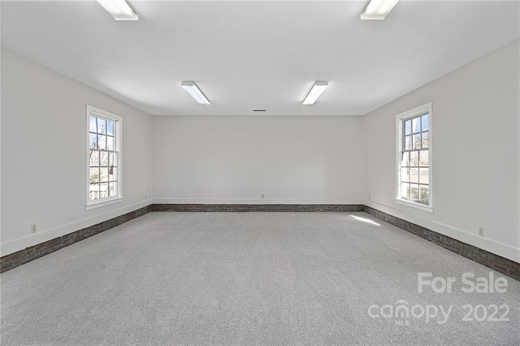 5130 Panhandle Circle Matthews, NC 28104 - Photo 10 of 20 an empty room with windows