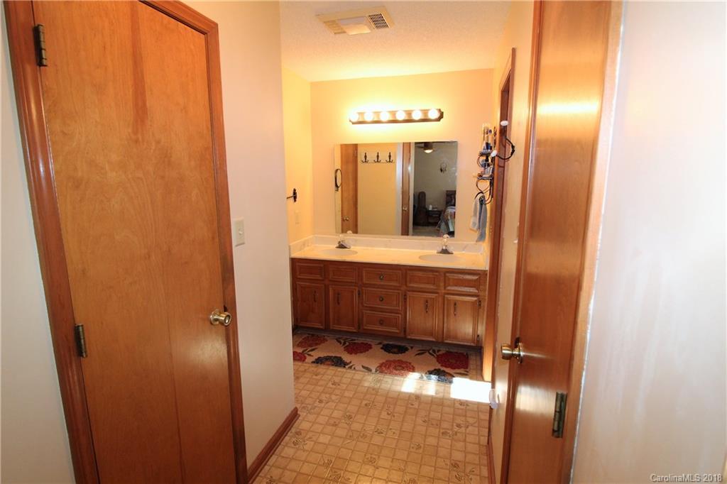 1930 Bobby Ray Road, Unit 10 Clover, SC 29710 - Photo 12 of 24 a bathroom with a sink and a mirror