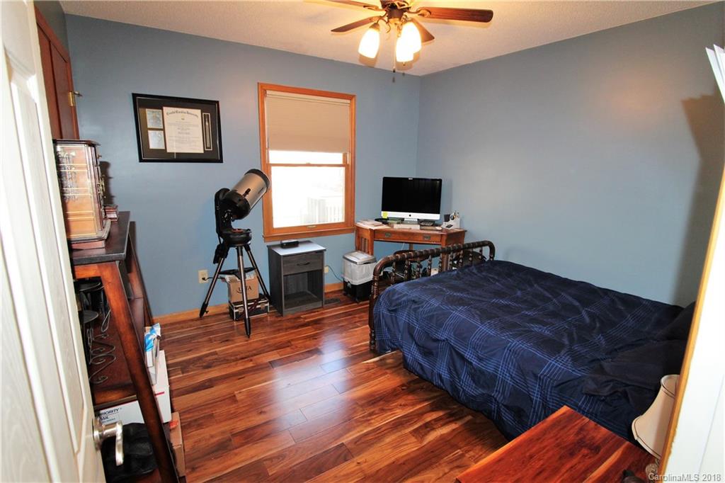 1930 Bobby Ray Road, Unit 10 Clover, SC 29710 - Photo 14 of 24 a living room with furniture and a flat screen tv