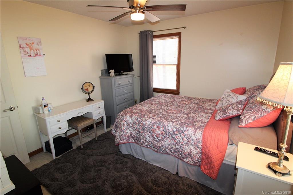 1930 Bobby Ray Road, Unit 10 Clover, SC 29710 - Photo 18 of 24 a bedroom with a bed and a flat screen tv
