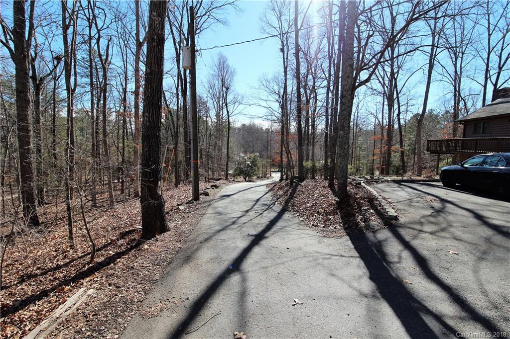 1930 Bobby Ray Road, Unit 10 Clover, SC 29710 - Photo 23 of 24 a view of a road with trees on the side of the road