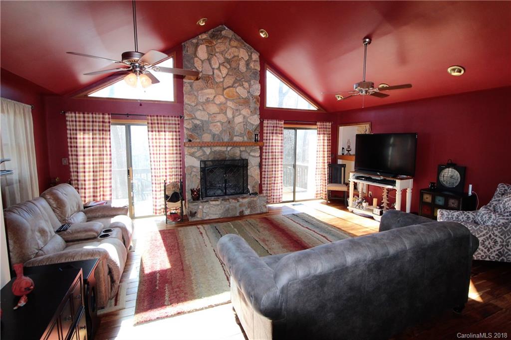 1930 Bobby Ray Road, Unit 10 Clover, SC 29710 - Photo 4 of 24 a living room with fireplace furniture and a flat screen tv