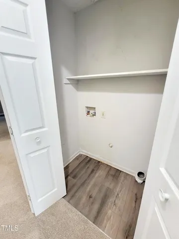 a bathroom with sink a mirror and a shower